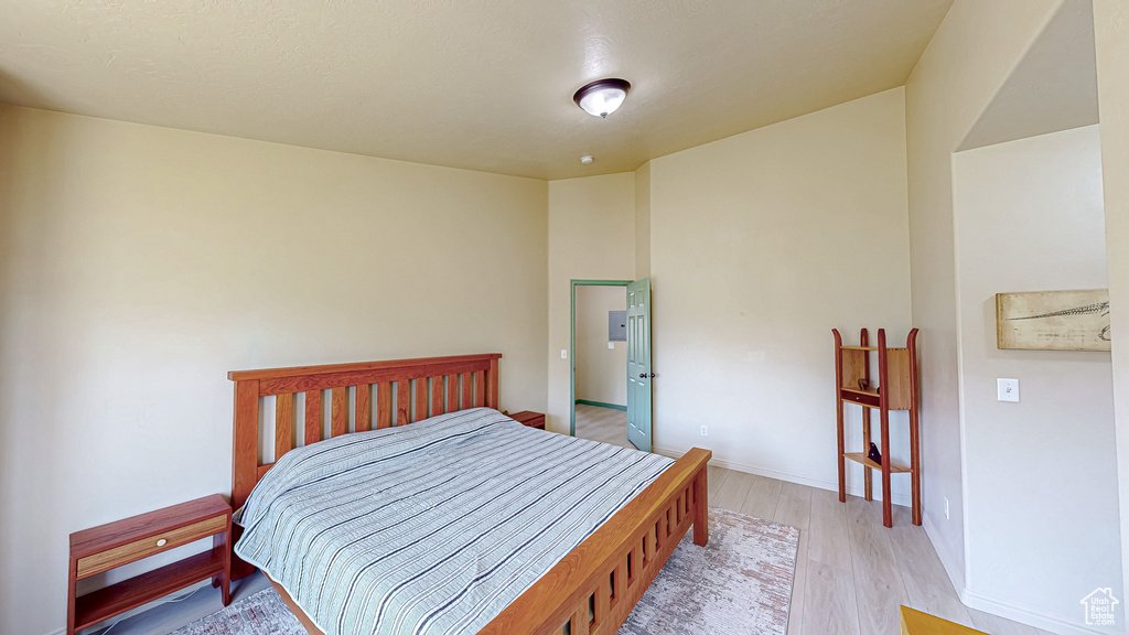 Bedroom with light wood finished floors