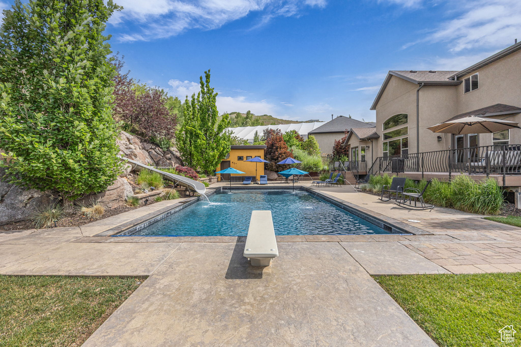 Outdoor pool with a patio area