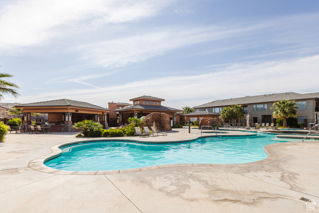Community pool featuring a gazebo and a patio area