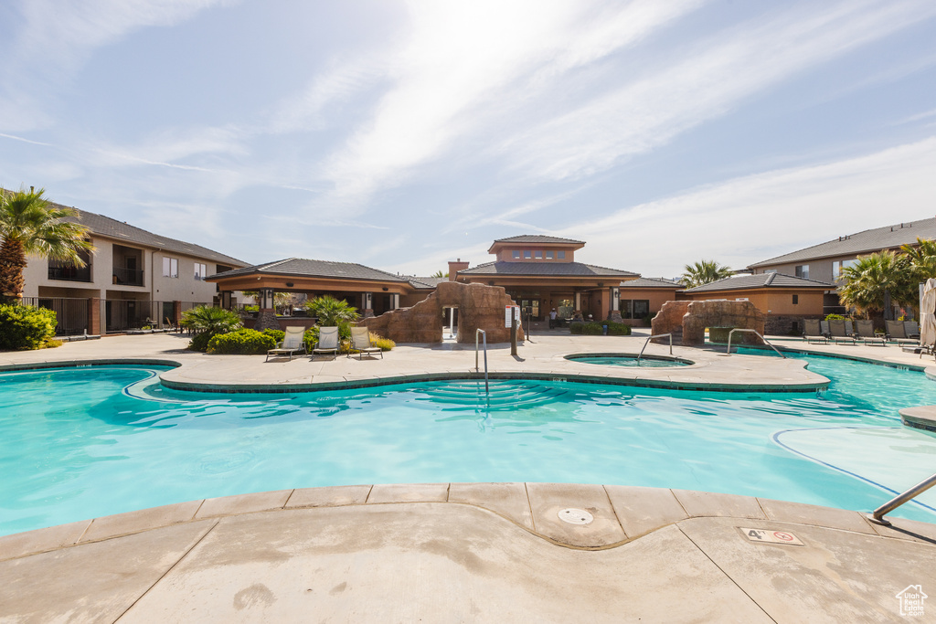 Community pool with a gazebo, a patio, and a community hot tub