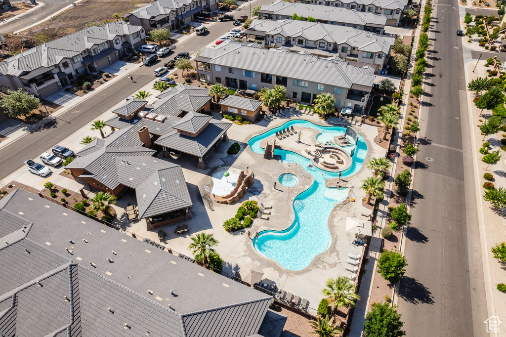 Aerial perspective of suburban area with a pool