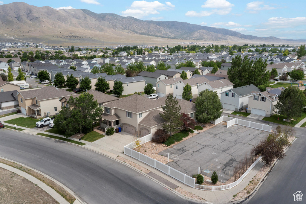 Aerial view of residential area with mountains