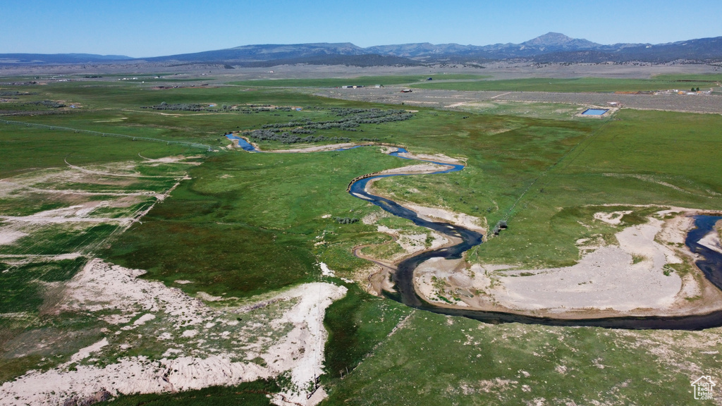 Aerial view of property\\\'s location featuring rural landscape and a mountain backdrop