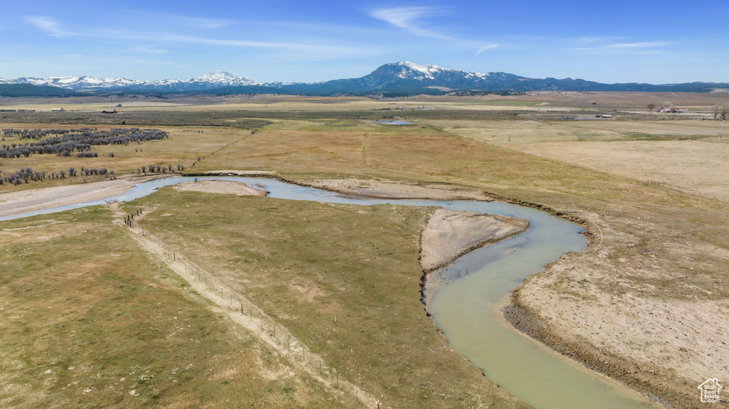 Aerial view of sparsely populated area with a mountainous background