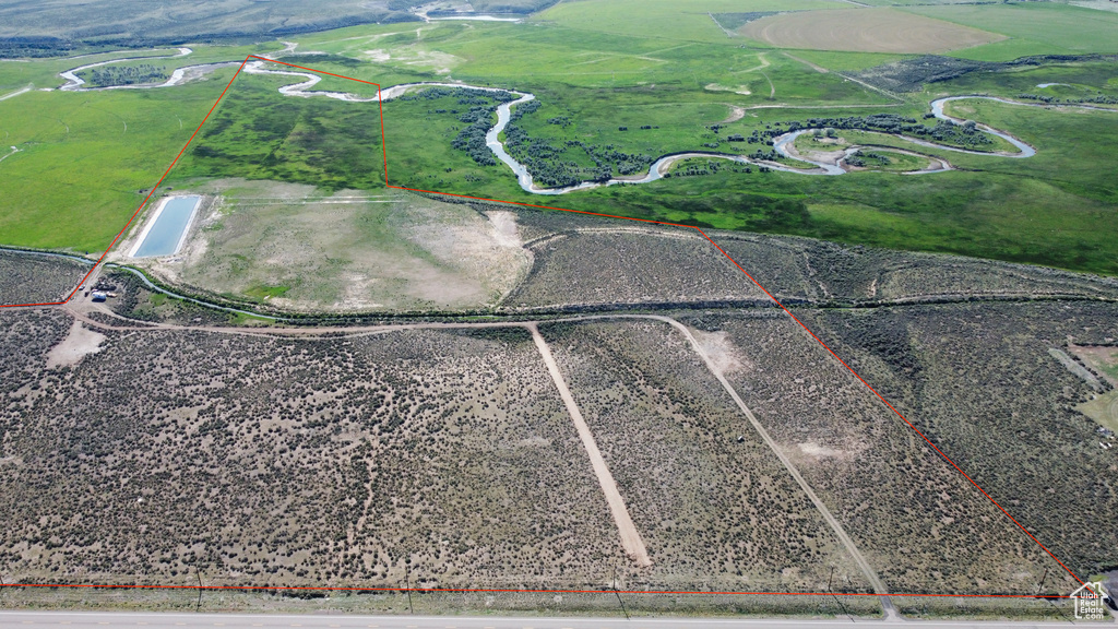 Overview of rural landscape featuring property boundaries highlighted
