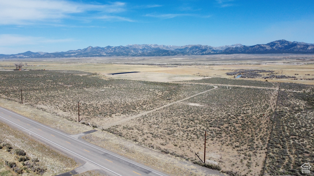 Overview of rural landscape with a mountain backdrop