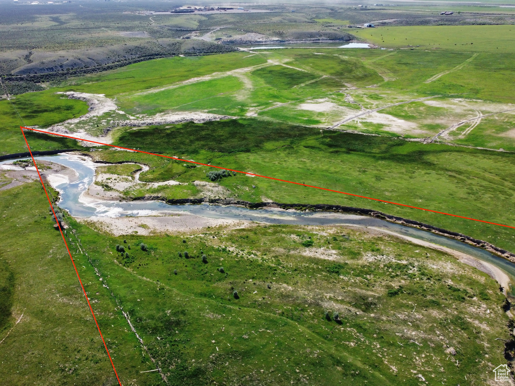 Aerial view of sparsely populated area with property boundaries highlighted