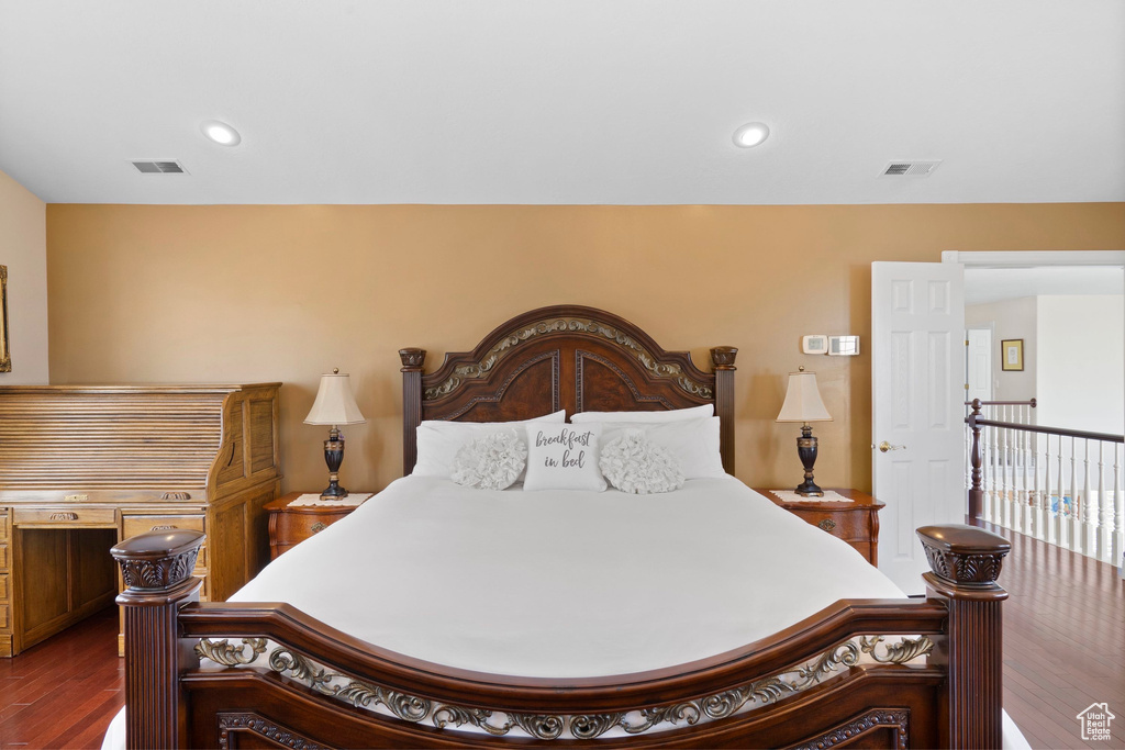 Bedroom featuring dark wood finished floors and recessed lighting