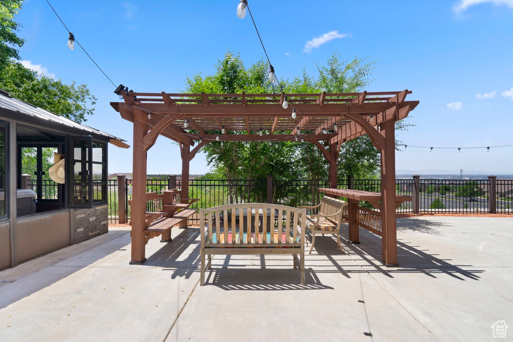View of patio featuring a pergola