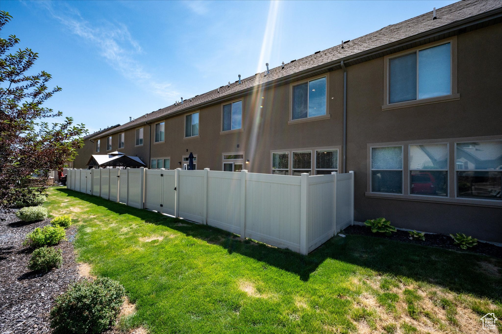 Back of property with stucco siding