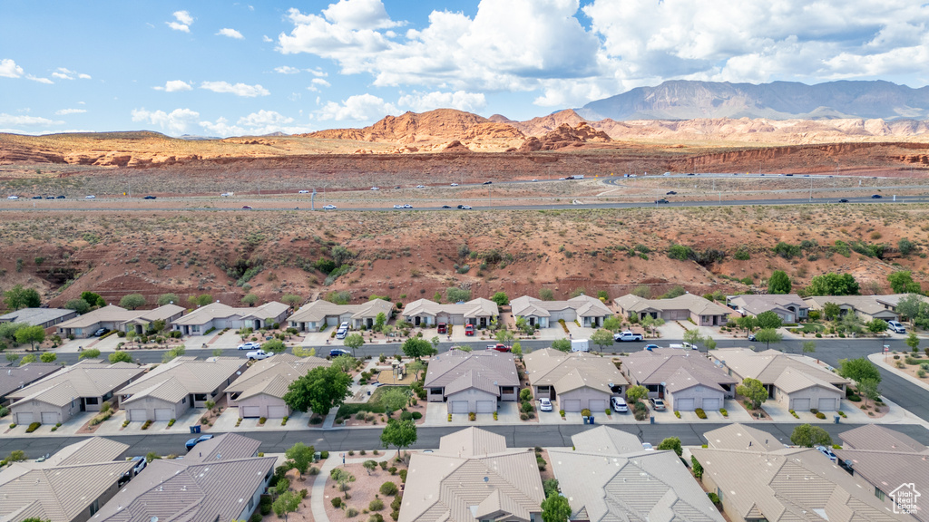 Aerial perspective of suburban area with a mountain backdrop