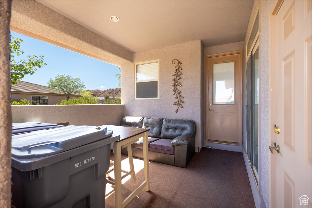 View of patio / terrace with a balcony