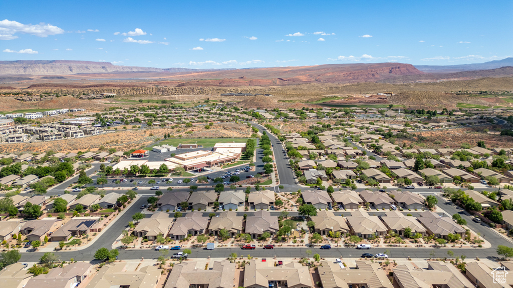 View of property location with a mountainous background and nearby suburban area