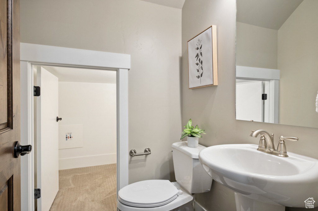 Bathroom with toilet and a sink