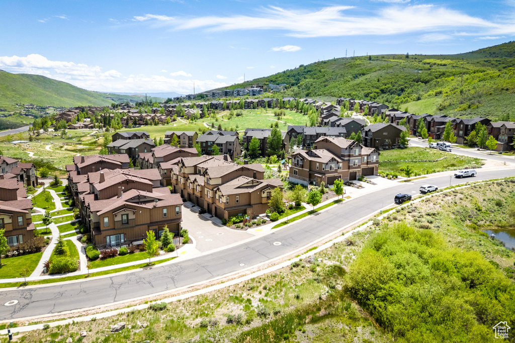 Aerial perspective of suburban area with mountains