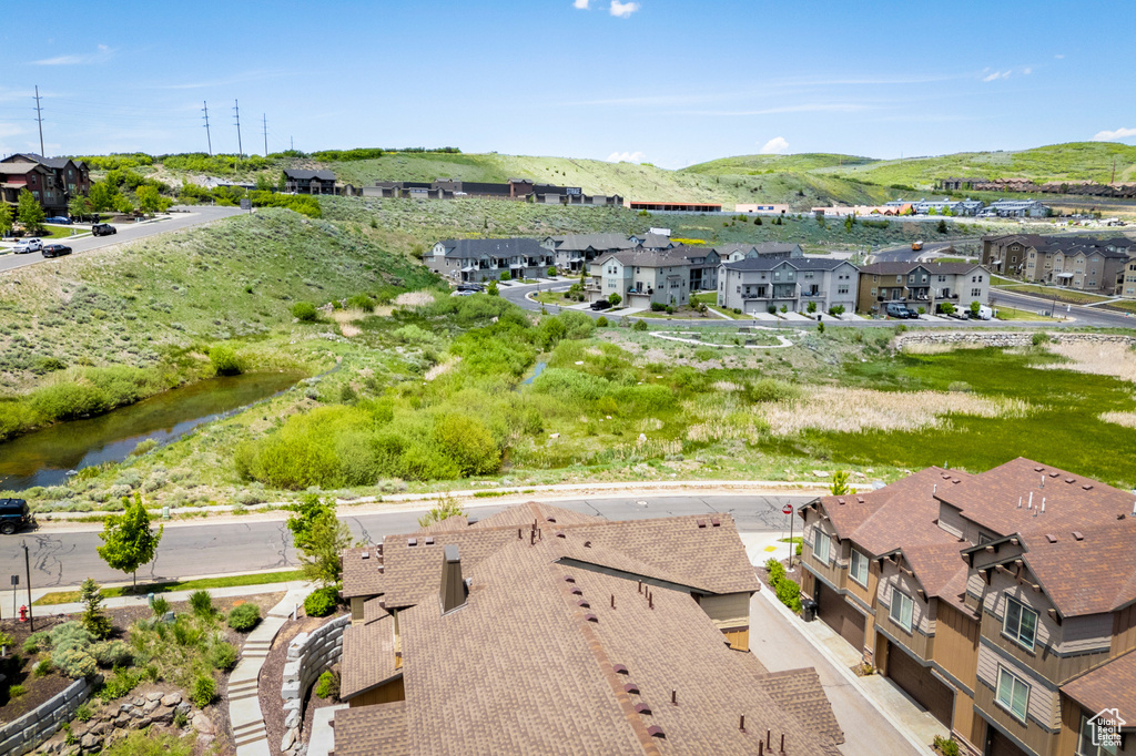 Aerial view of residential area with a mountain backdrop