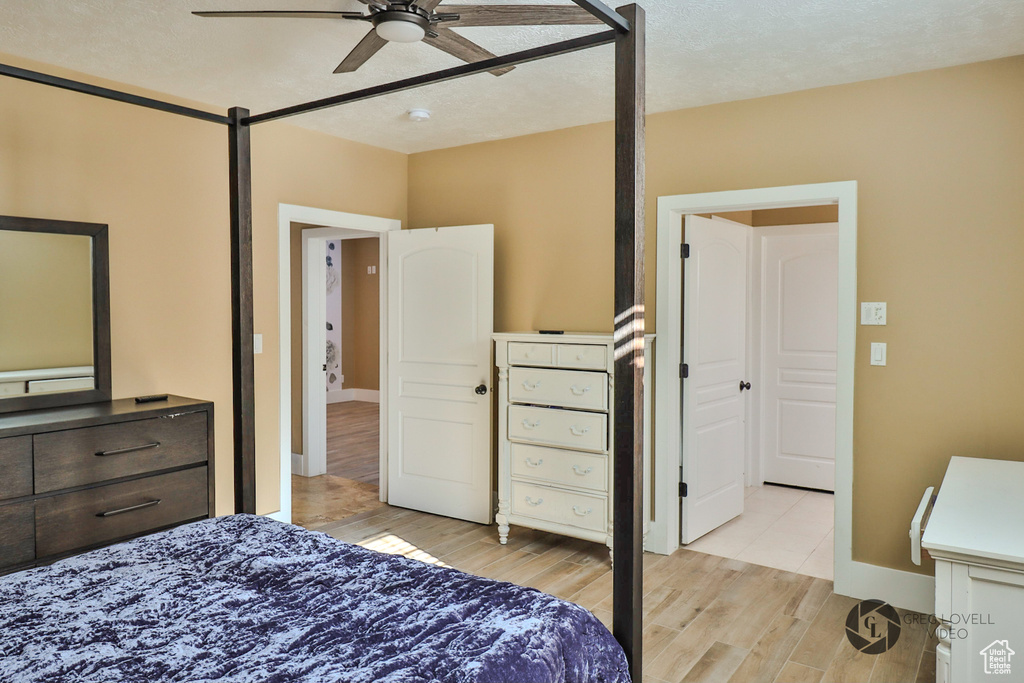 Bedroom featuring light wood finished floors and ceiling fan