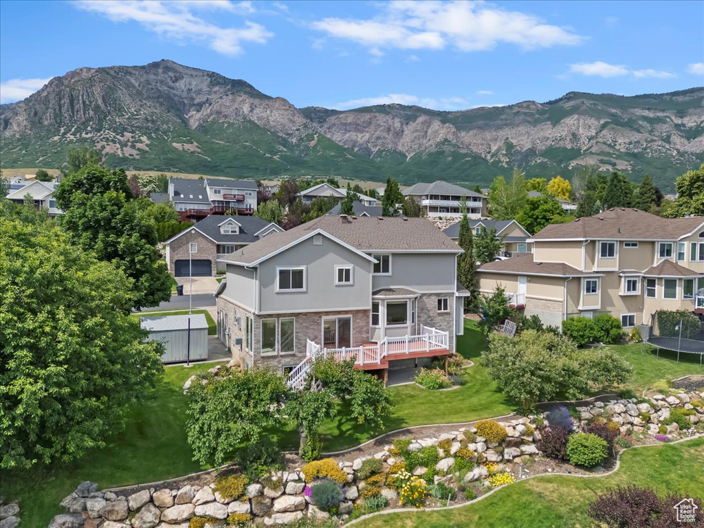 View of mountain backdrop with nearby suburban area