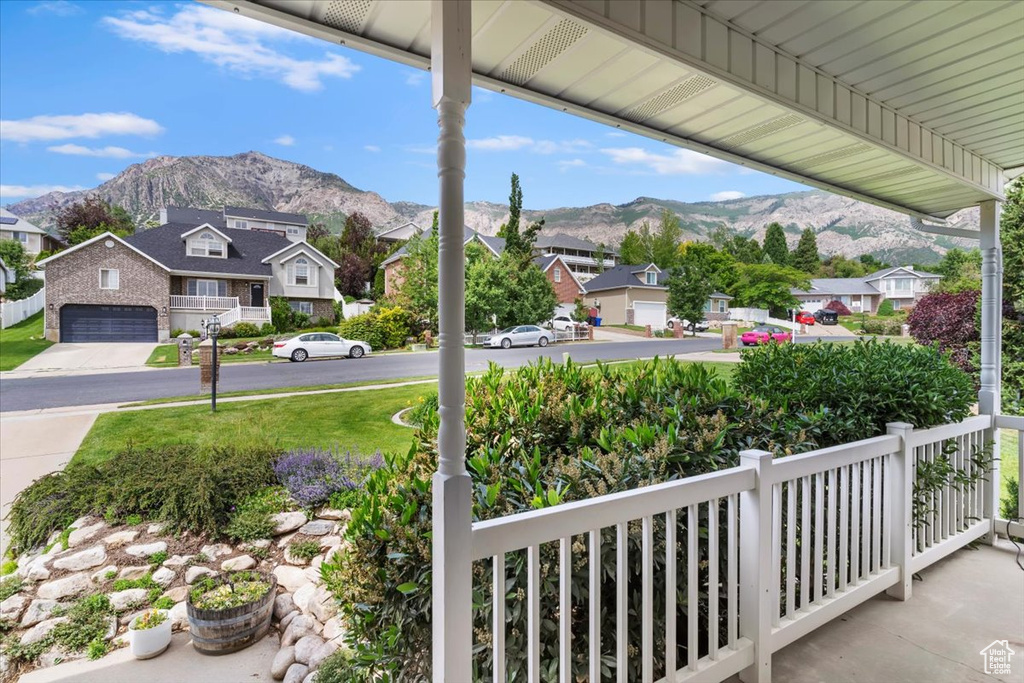 View of patio featuring a residential view and a mountain view