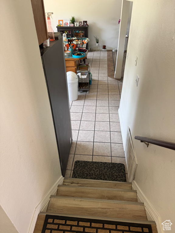 Stairway with tile patterned flooring