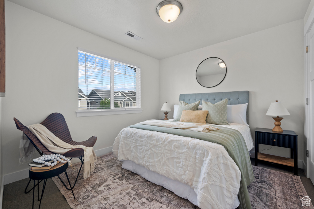 Bedroom featuring baseboards