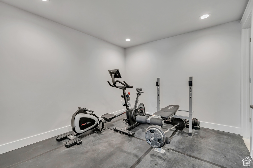 Workout area featuring recessed lighting and baseboards