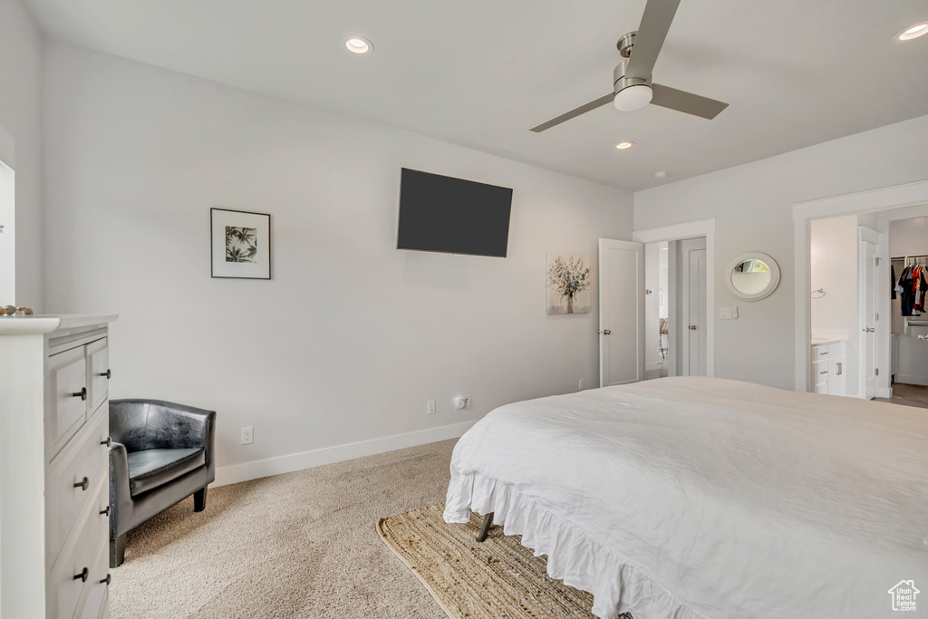 Bedroom featuring light colored carpet, recessed lighting, baseboards, and a ceiling fan