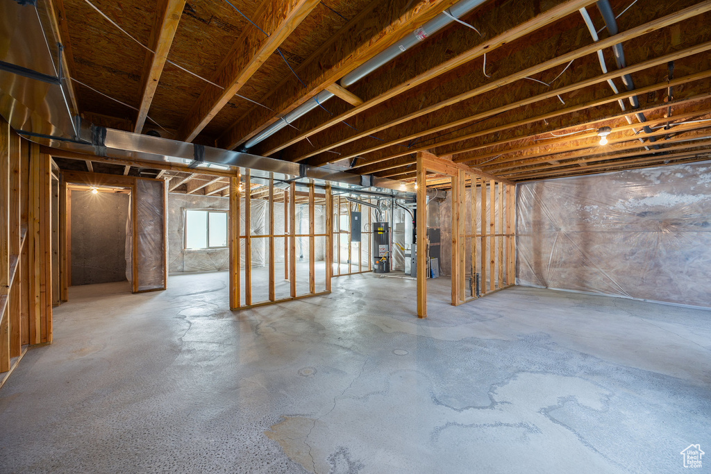 Basement with water heater and heating unit
