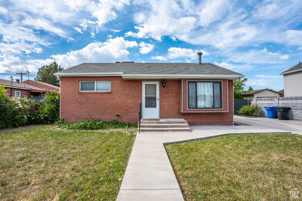 View of front of house featuring brick siding and entry steps