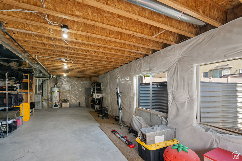 Below grade area featuring secured water heater