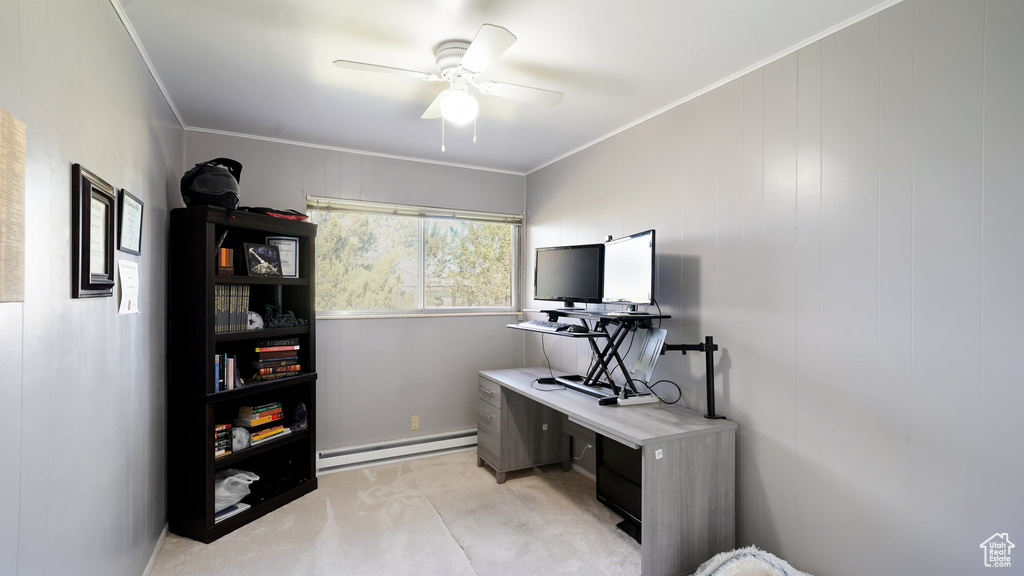 Office area featuring baseboard heating, ceiling fan, and ornamental molding
