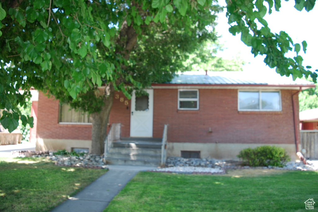 View of front of home with brick siding