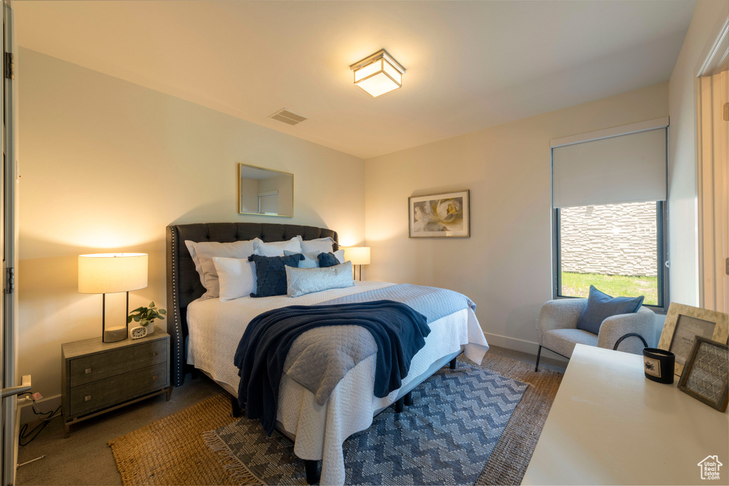 Bedroom featuring baseboards
