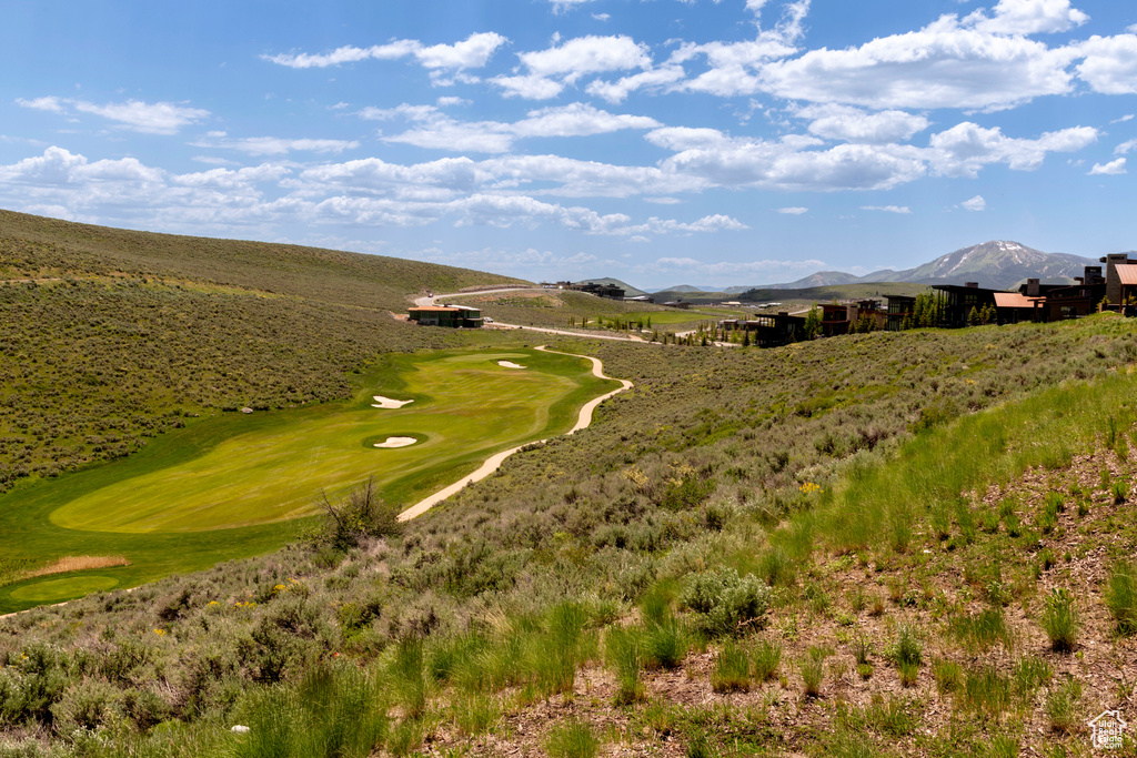View of property's community with a mountain view and golf course view