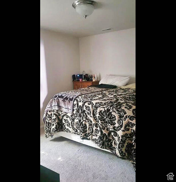 Bedroom featuring carpet floors