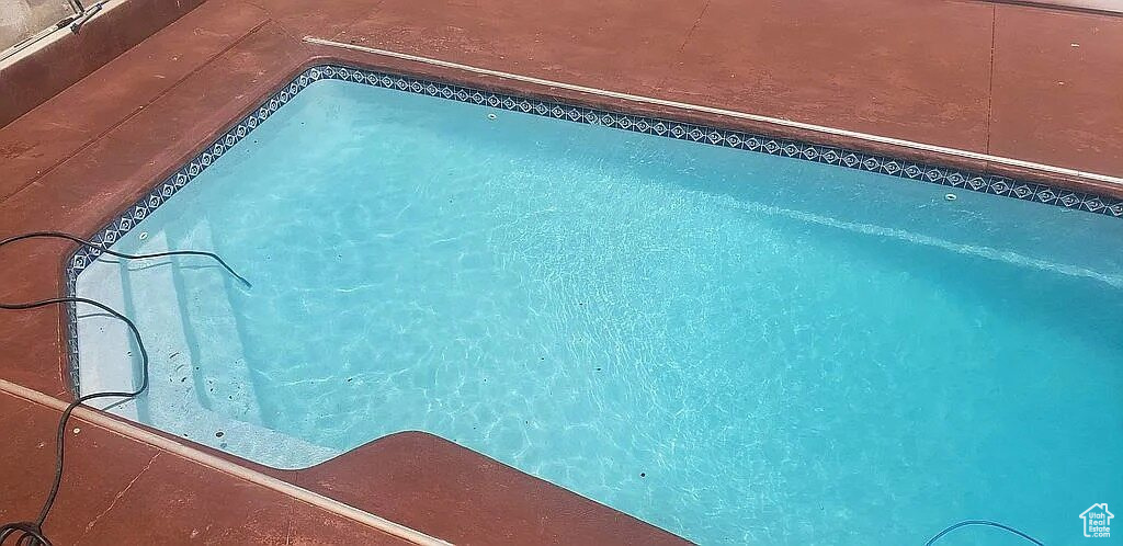 View of pool with a swimming pool
