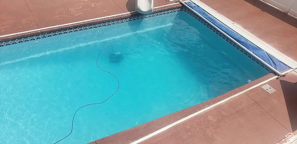 View of swimming pool with heating fuel