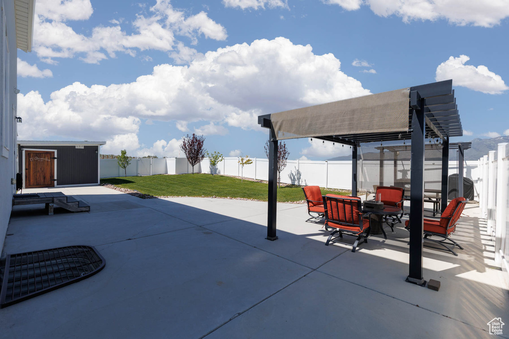 View of patio / terrace featuring outdoor dining space and a pergola