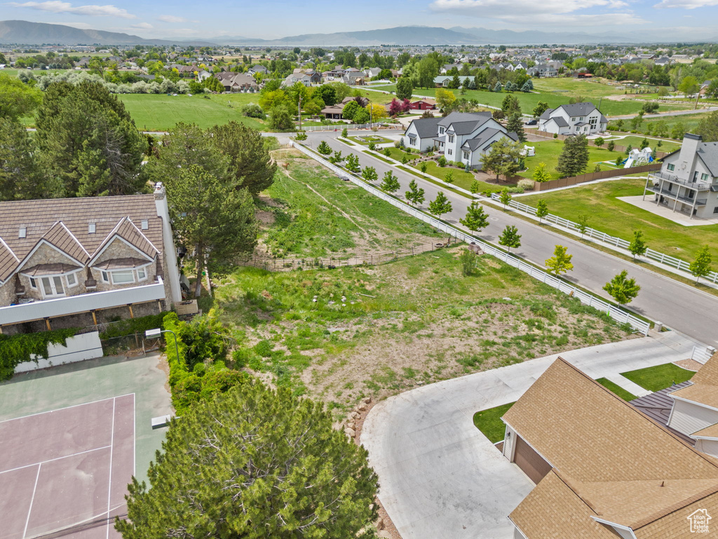 Aerial view of residential area with a mountainous background