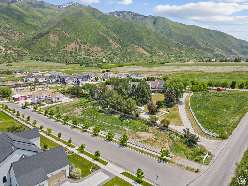 View of mountain background featuring nearby suburban area