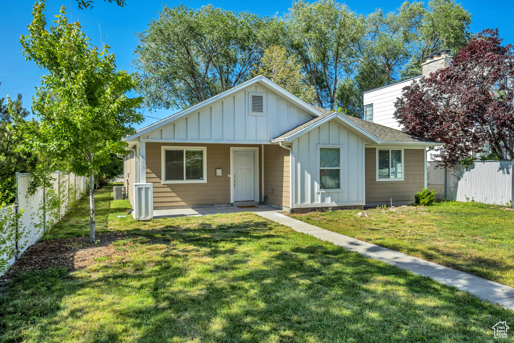 View of front of house featuring board and batten siding