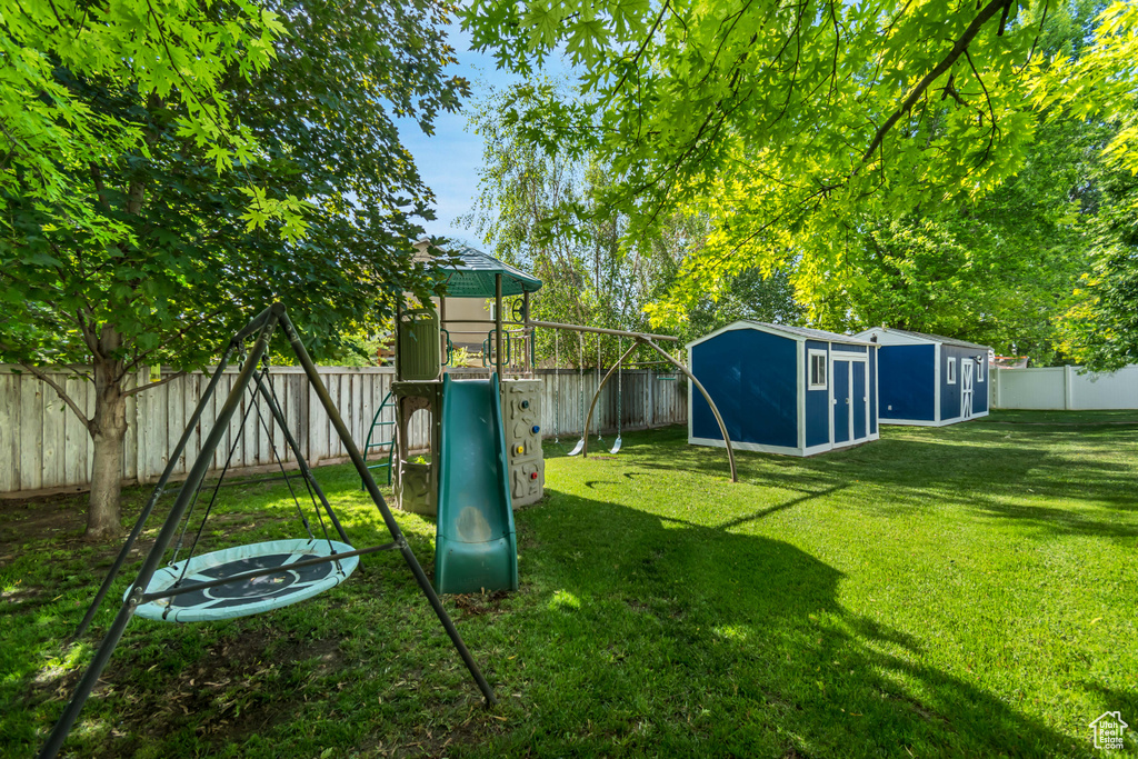 View of yard featuring a playground