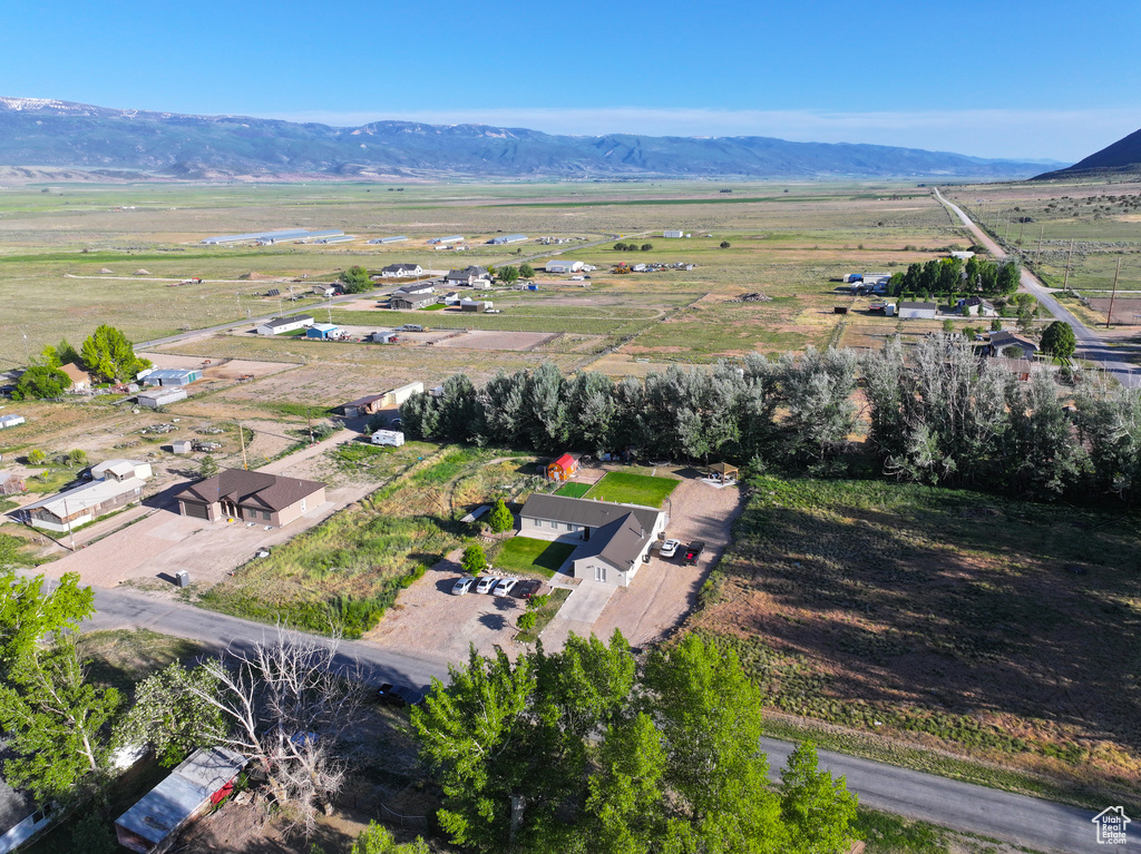 Aerial overview of property\\\\\\\'s location featuring rural landscape and a mountainous background