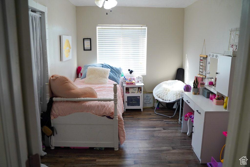 Bedroom with dark wood finished floors