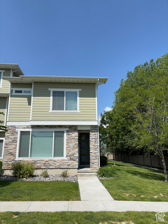 View of front of home with stone siding