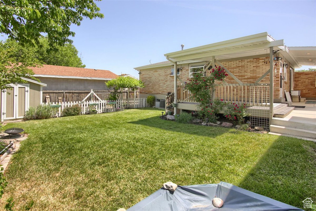 View of yard featuring a deck