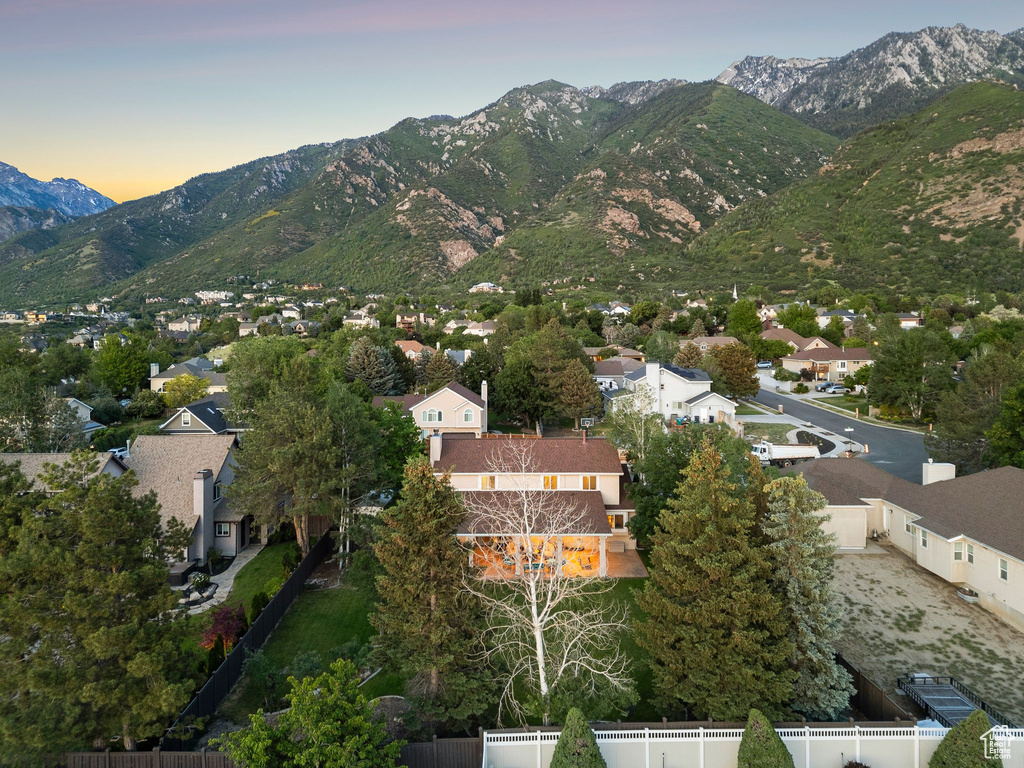 View of mountain background featuring nearby suburban area