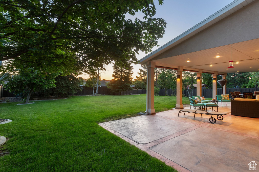 View of yard featuring outdoor lounge area and a patio