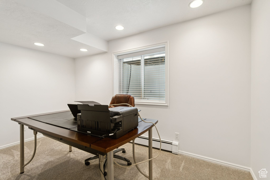 Carpeted home office featuring baseboard heating, baseboards, and recessed lighting