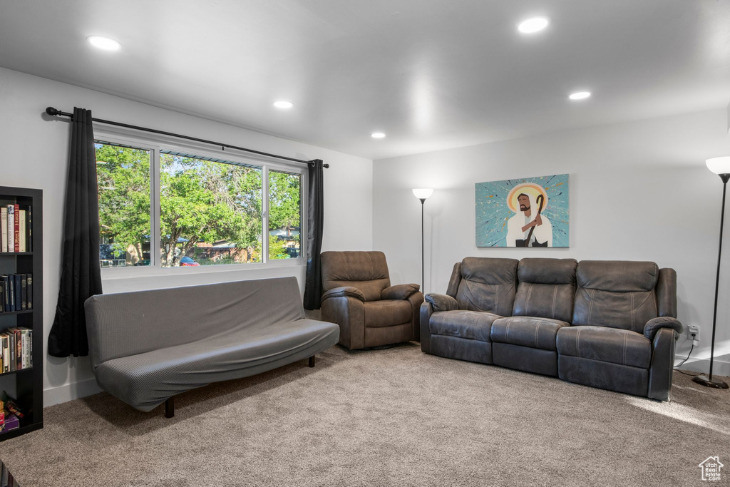 Living area featuring carpet floors and recessed lighting